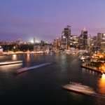 Aerial view of Sydney harbour and Opera House at twilight - Australia consular services