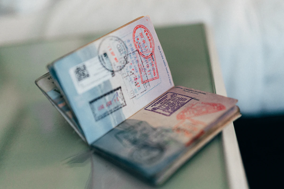 Passport with visa stamps used in the Campus France student visa process