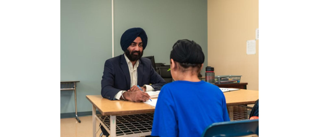 Learner Aid counsellor reviewing a student's Canada study permit application documents
