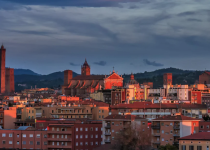 Bologna rooftops and towers at sunset, a leading city to study in Italy 2026