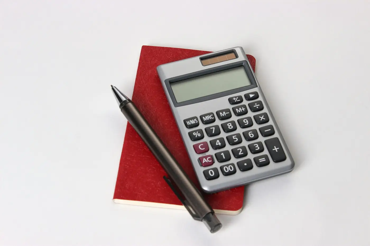 Calculator and notebook for working out the true cost of each offer