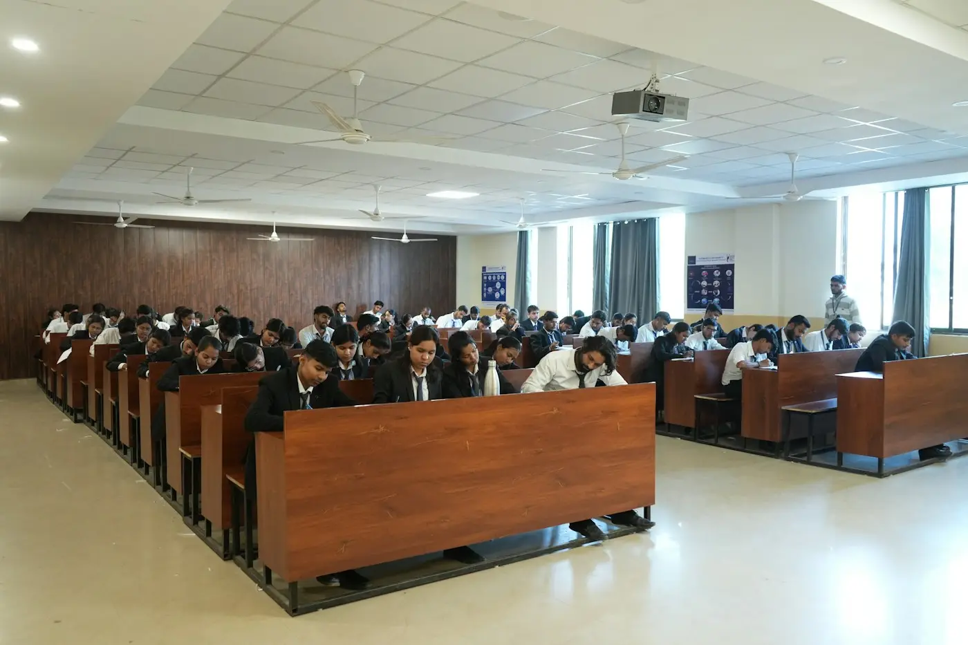 Students in an exam hall, the setting for GRE and GMAT test centre appointments