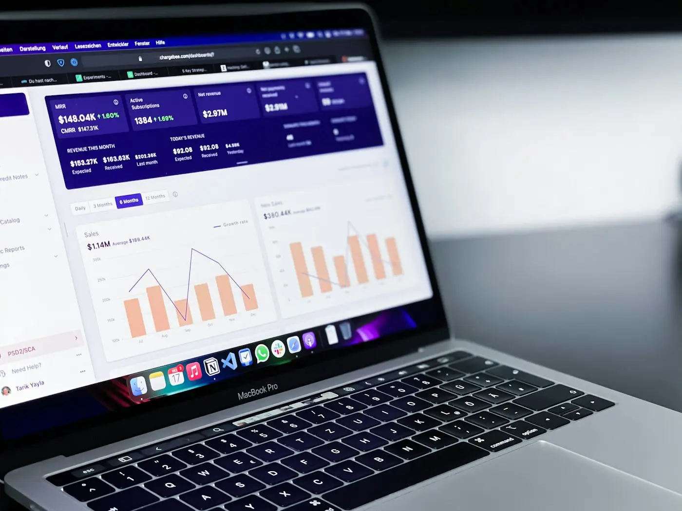 Laptop showing charts, for scoring university offers side by side