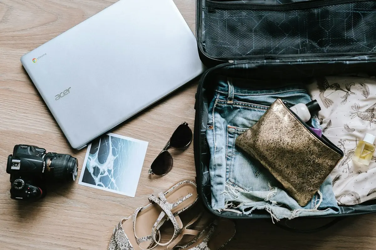 Student packing a suitcase in the final month of a fall study abroad timeline