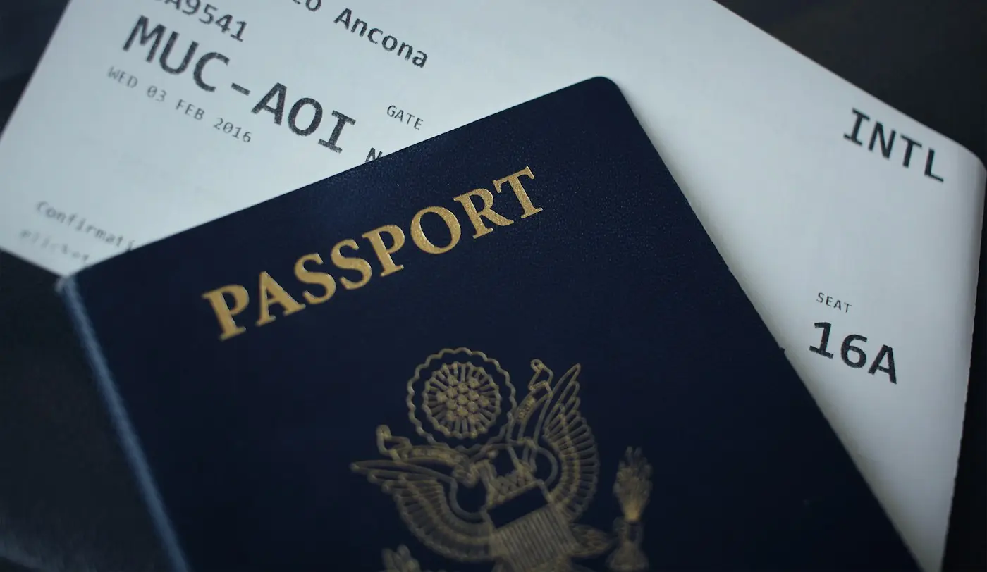 Passport and boarding pass, a reminder that visa rules decide which English test counts