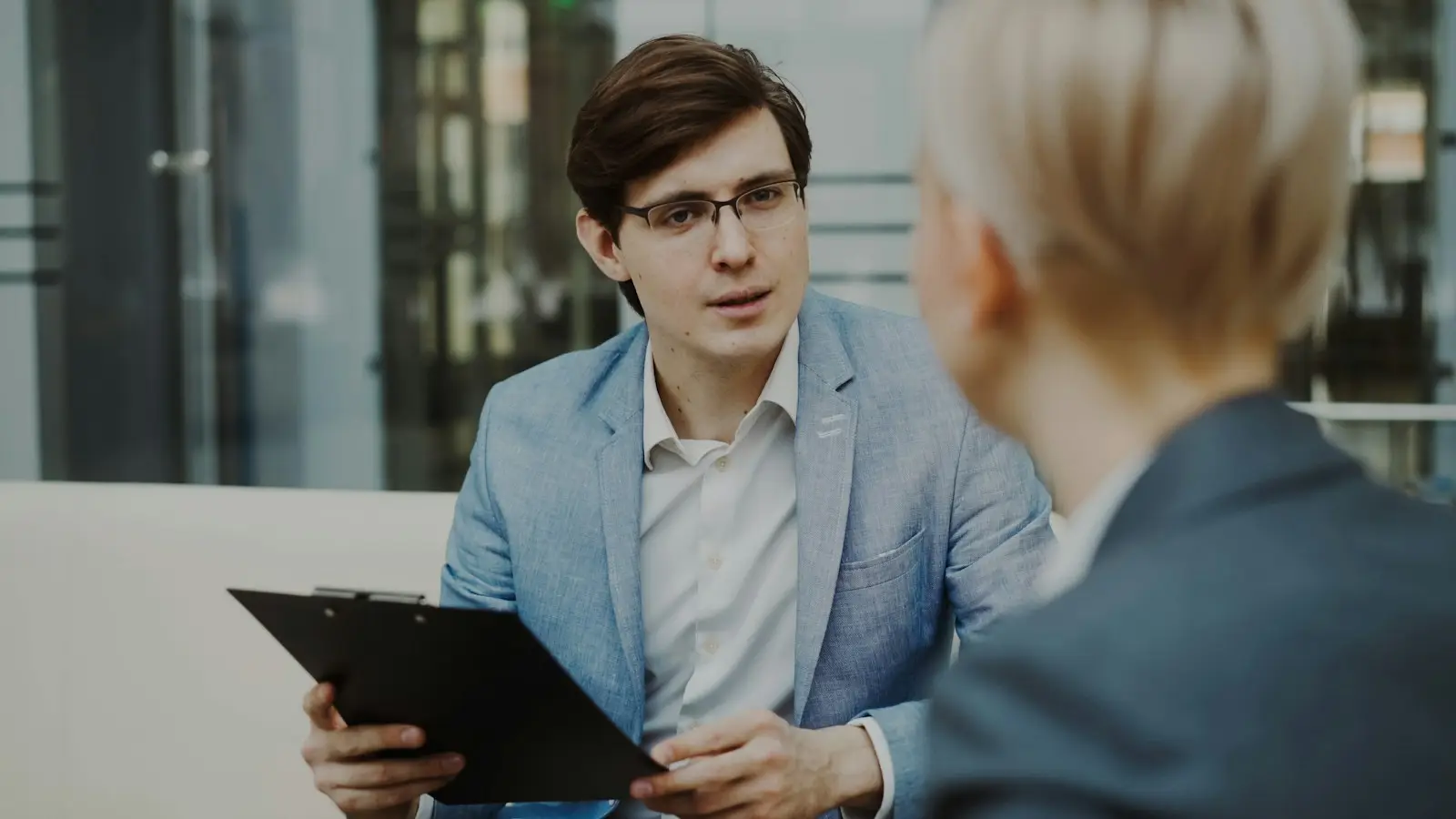 Student practising for a study abroad interview in a smart blazer