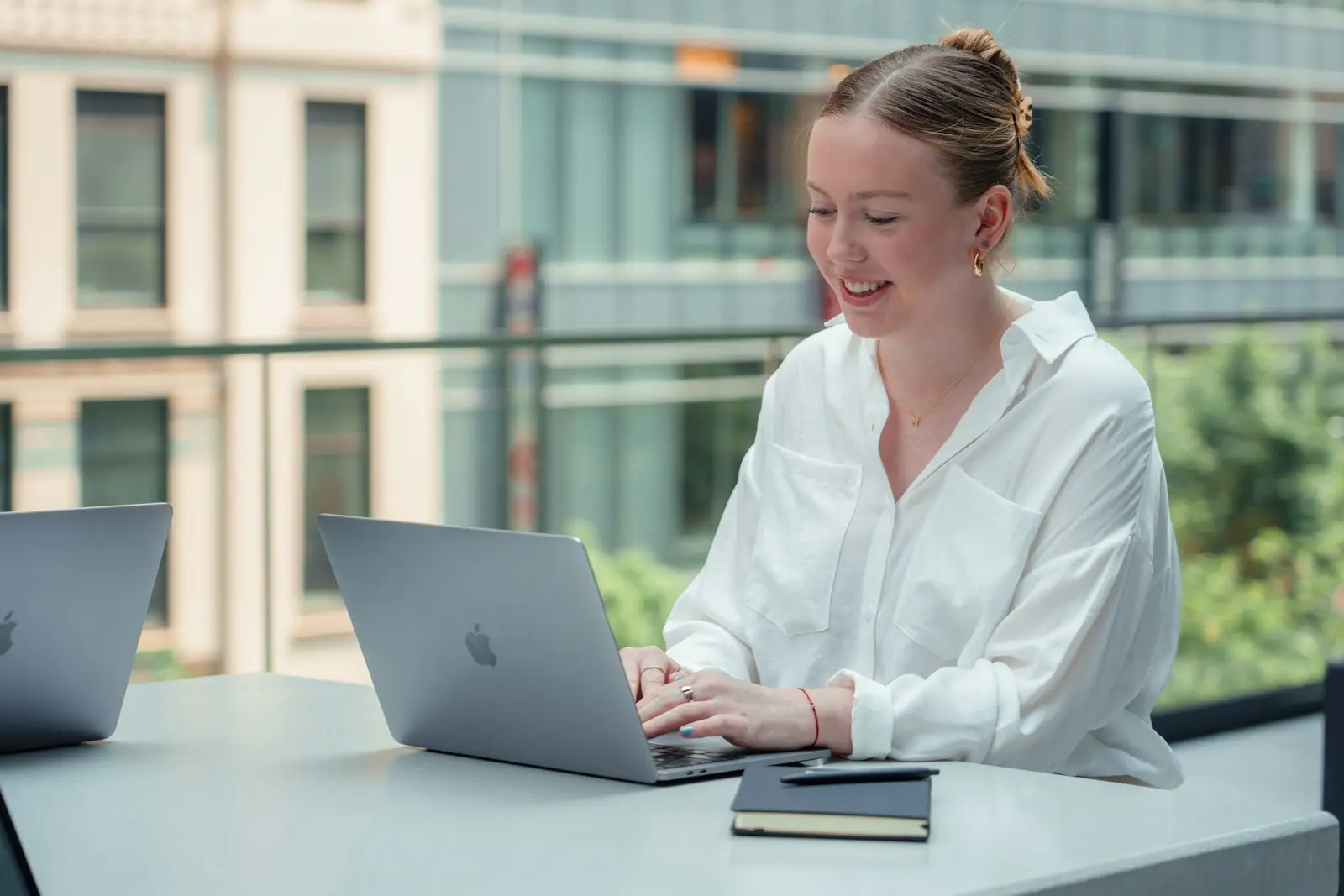Student working at a laptop to shortlist universities abroad