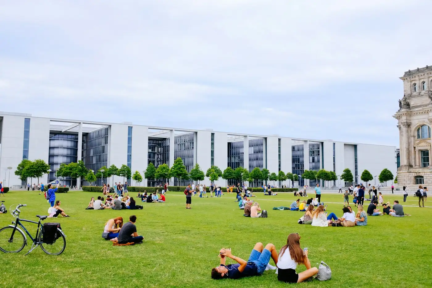 Students relaxing on a university lawn, a reminder that rankings are only part of the picture